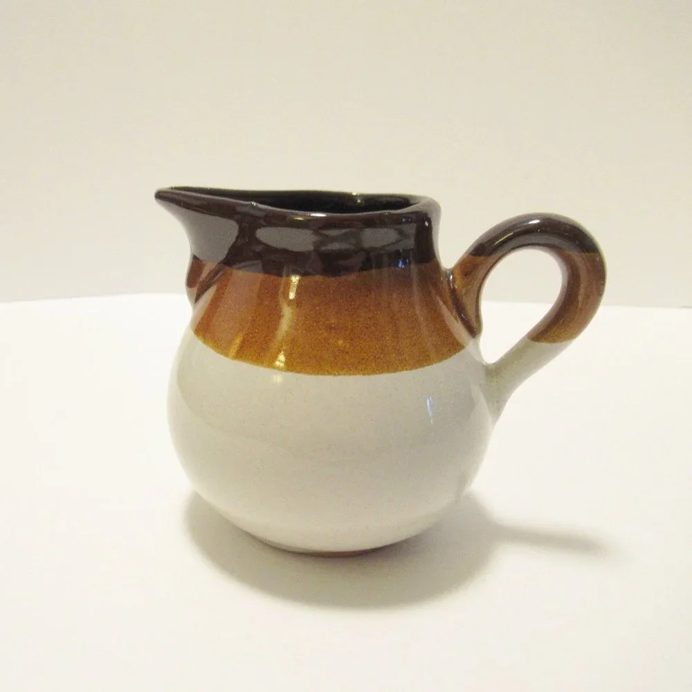 Brown and White Ceramic Serveware Pitcher